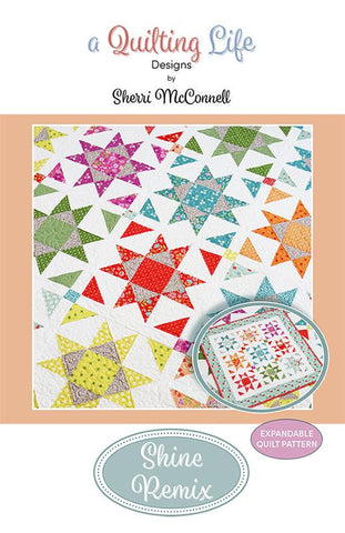 Image of the Shine Remix quilt pattern by A Quilting Life for Moda Fabrics. Features a quilt with multicolored stars.
Cute Little Fabric Shop