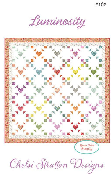 Image of the Luminosity quilt pattern by A Quilting Life for Moda Fabrics. Features a quilt with hearts and squares on a white background.
Cute Little Fabric Shop