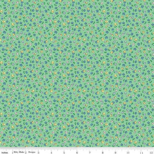 Image of the Playtime 30s Flowers Green quilting cotton fabric by Lindsay Wilkes for Riley Blake Designs. Features small scattered flowers on an light green background. 
Cute Little Fabric Shop