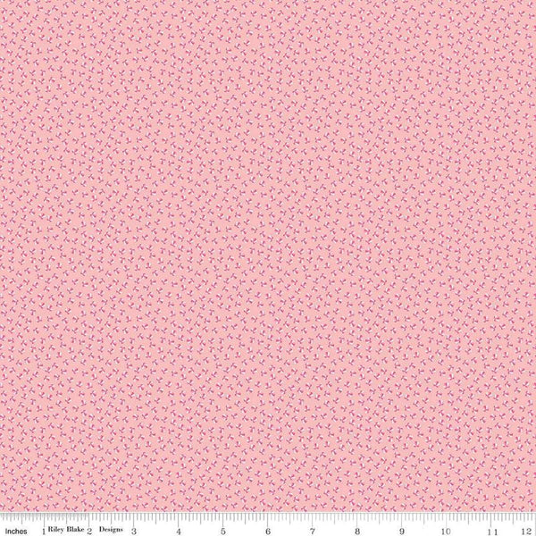 Image of the Playtime 30s Bouncy Balls Pink quilting cotton fabric by Lindsay Wilkes for Riley Blake Designs. Features small balls on a light pink background. 
Cute Little Fabric Shop