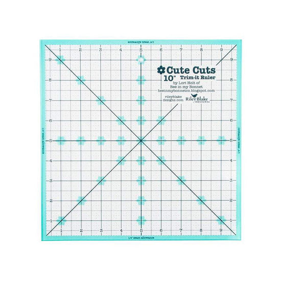 Image of the Cute Cuts™ Trim-it™ Ruler 10" x 10" by Lori Holt for Riley Blake Designs. Features a 10 inch square ruler with aqua borders. 
Cute Little Fabric Shop