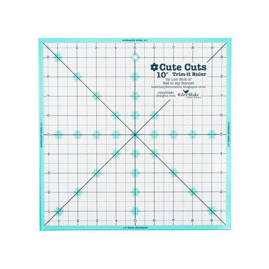 Image of the Cute Cuts™ Trim-it™ Ruler 10" x 10" by Lori Holt for Riley Blake Designs. Features a 10 inch square ruler with aqua borders. 
Cute Little Fabric Shop