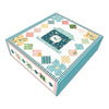 Image of the Melody Lane Quilt Boxed Kit by Beverly McCullough for Riley Blake Designs. Features clocks and stars with many colors on a white background in a keepsake box.
Cute Little Fabric Shop