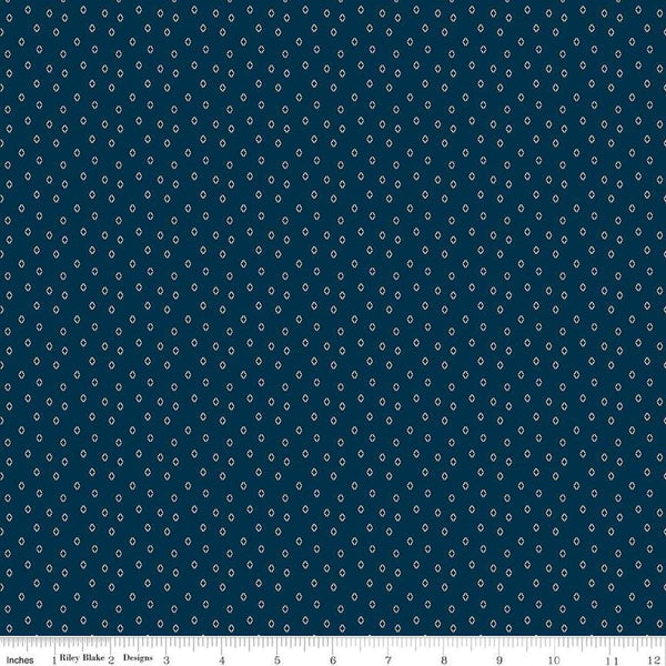 Image of the Cheddar at Twilight Diamonds Navy quilting cotton fabric by Riley Blake Designs. Features small diamonds arranged on a dark blue background. 
Cute Little Fabric Shop