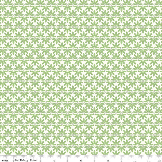 Image of the Melody Deco Leaves Grass quilting cotton fabric by Beverly McCullough for Riley Blake Designs. Features geometric green flowers on a white background. 
Cute Little Fabric Shop