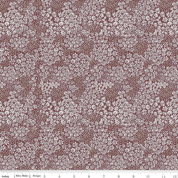Image of the A Walk on the Prairie Silhouette Marsala quilting cotton fabric by Modern Prairie for Riley Blake Designs. Features small flowers and dots on a dark maroon background.
Cute Little Fabric Shop