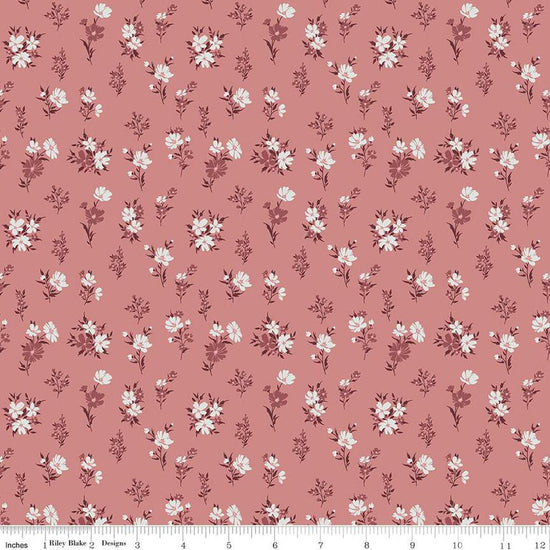 Image of the A Walk on the Prairie Floral Dusty Rose quilting cotton fabric by Modern Prairie for Riley Blake Designs. Features small flowers on a medium dusty rose background.
Cute Little Fabric Shop
