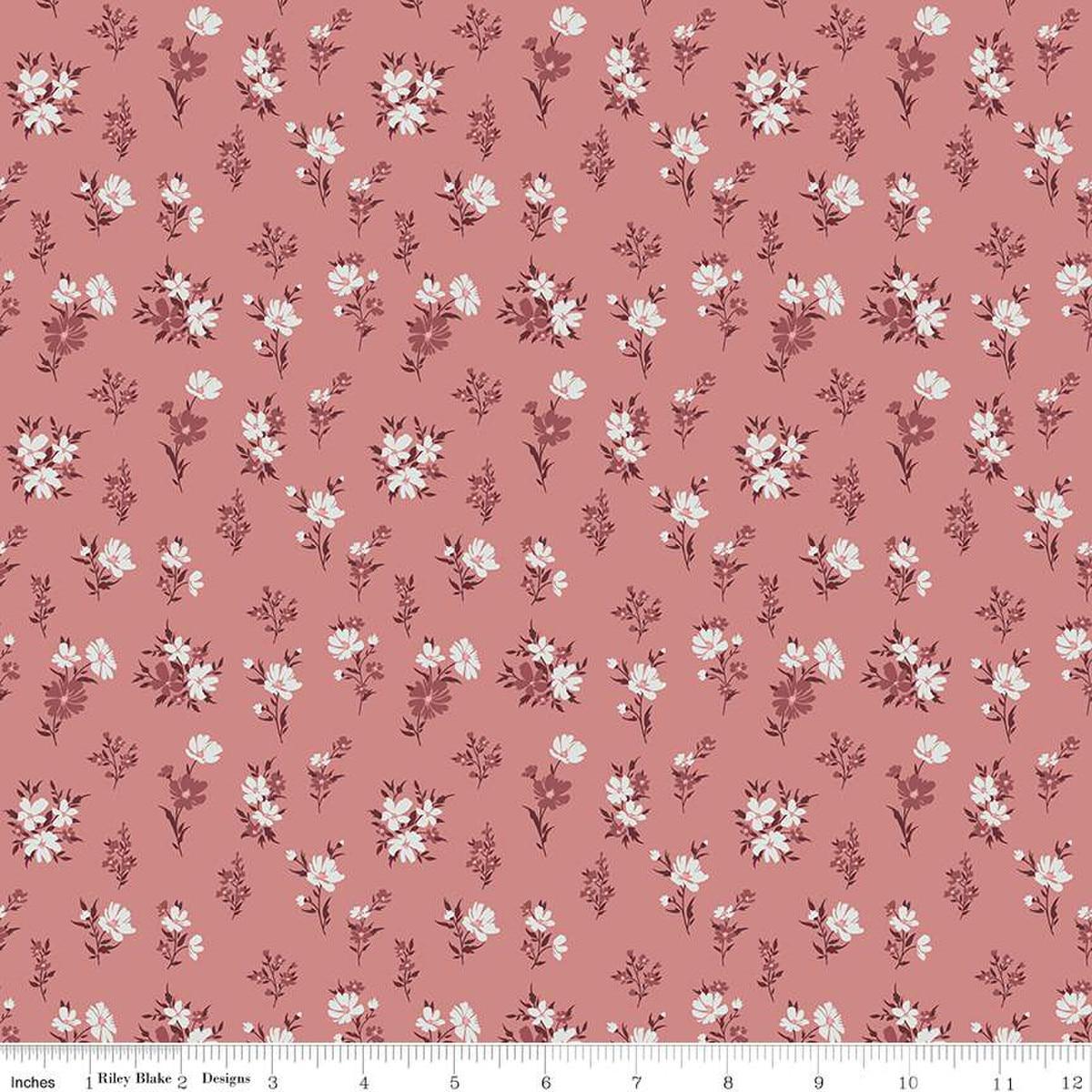 Image of the A Walk on the Prairie Floral Dusty Rose quilting cotton fabric by Modern Prairie for Riley Blake Designs. Features small flowers on a medium dusty rose background.
Cute Little Fabric Shop