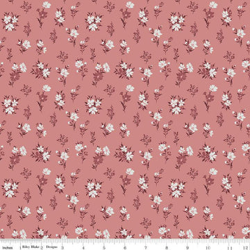 Image of the A Walk on the Prairie Floral Dusty Rose quilting cotton fabric by Modern Prairie for Riley Blake Designs. Features small flowers on a medium dusty rose background.
Cute Little Fabric Shop