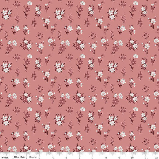 Image of the A Walk on the Prairie Floral Dusty Rose quilting cotton fabric by Modern Prairie for Riley Blake Designs. Features small flowers on a medium dusty rose background.
Cute Little Fabric Shop