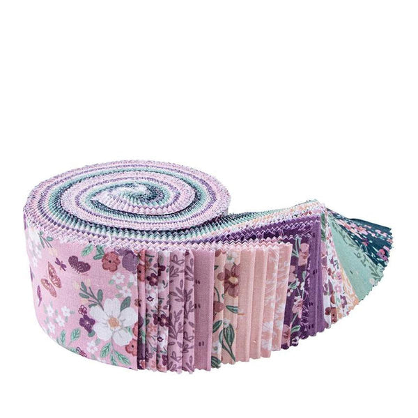 Image of the Buds & Butterflies Rolie Polie by Cayla Naylor for Riley Blake Designs. Features floral fabrics on pink, purple, and blue backgrounds. 
Cute Little Fabric Shop