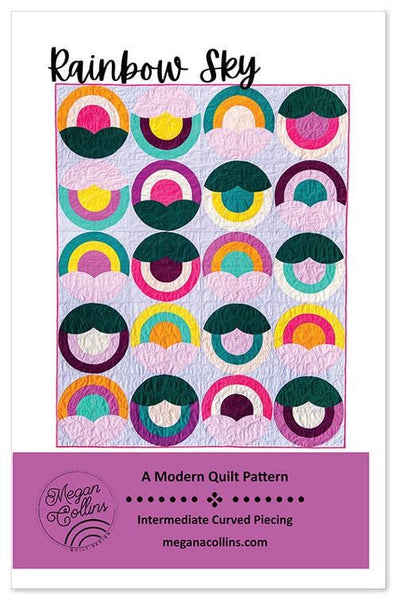 Image of the Rainbow Sky quilt pattern by Megan Collins Quilt Design for Moda Fabrics. Features sunrise patterns in circles. 
Cute Little Fabric Shop