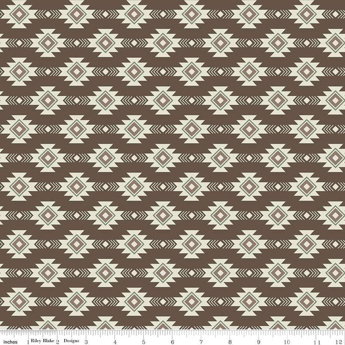 Image of the Lets Get Lost in the Woods Geometric Brown quilting cotton fabric by Tara Reed for Riley Blake Designs. Features a geometric striped design on a dark brown background. 
Cute Little Fabric Shop