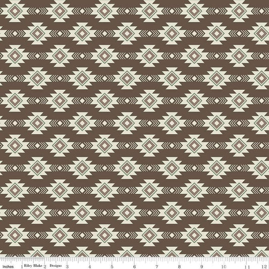 Image of the Lets Get Lost in the Woods Geometric Brown quilting cotton fabric by Tara Reed for Riley Blake Designs. Features a geometric striped design on a dark brown background. 
Cute Little Fabric Shop