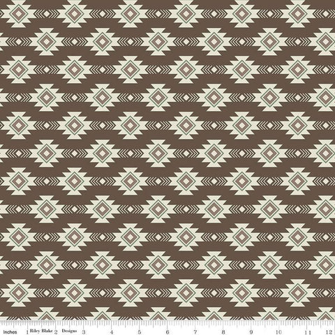 Image of the Lets Get Lost in the Woods Geometric Brown quilting cotton fabric by Tara Reed for Riley Blake Designs. Features a geometric striped design on a dark brown background. 
Cute Little Fabric Shop