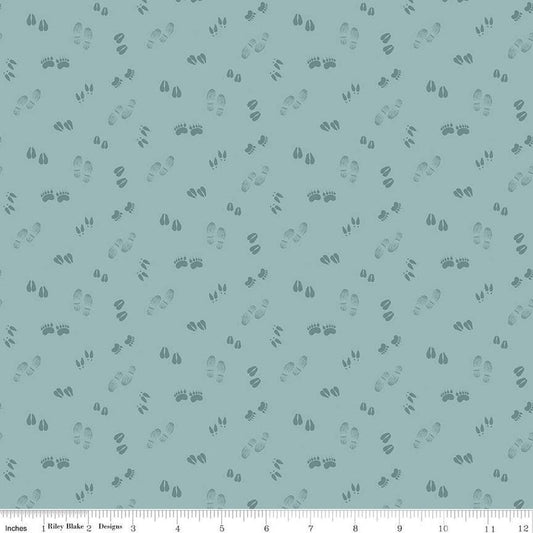 Image of the Lets Get Lost in the Woods Tracks Vintage Blue quilting cotton fabric by Tara Reed for Riley Blake Designs. Features tone on tone animal tracks on a light blue background. 
Cute Little Fabric Shop