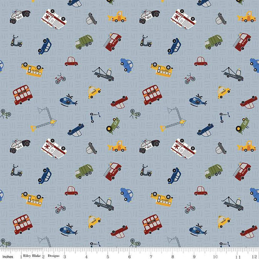 Image of the It Takes a Village Traffic Jam Gray quilting cotton fabric by Jennifer Long for Riley Blake Designs. Features scattered vehicles on a tone-on-tone textured gray background. 
Cute Little Fabric Shop