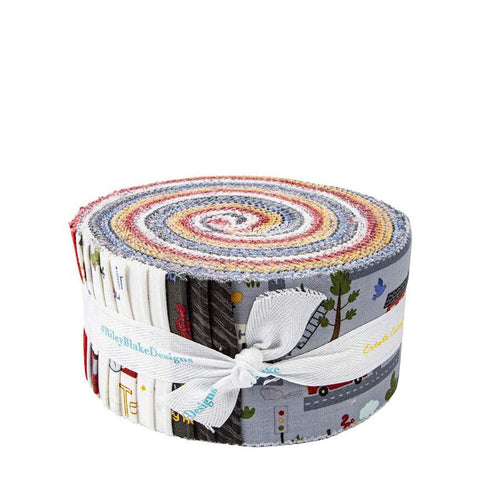 Image of the It Takes a Village Rolie Polie quilting cotton fabric by Jennifer Long for Riley Blake Designs. Features red, yellow, and blue fabrics with streets, buildings, and cars. 
Cute Little Fabric Shop