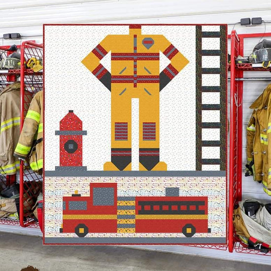 Image of the Be a Firefighter Quilt Pattern by Jennifer Long for Riley Blake Designs. Features a firefighter suit, hydrant, ladder, and truck. 
Cute Little Fabric Shop