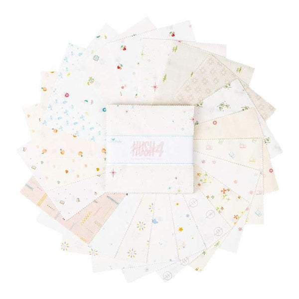 Image of the Hush Hush 5&quot; Stacker by Riley Blake Designs. Features low volume designs on various white and cream backgrounds. 
Cute Little Fabric Shop