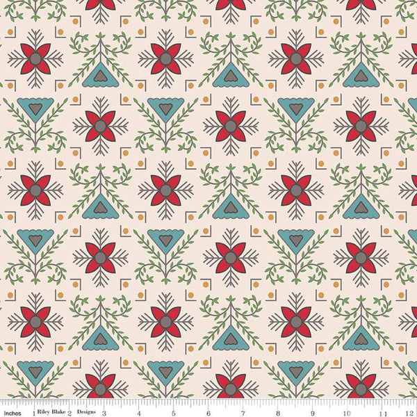 Image of the Home Town Holiday Stitchery Schoolhouse quilting cotton wide back fabric by Lori Holt for Riley Blake Designs. Features a damask-type design with flowers and leaves on a tan pink background. 
Cute Little Fabric Shop