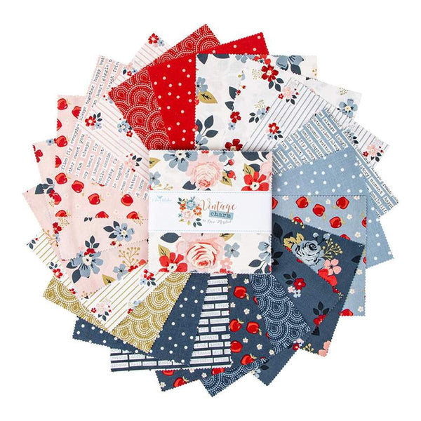 Image of the Vintage Charm 5 inch stacker by Dani Mogstad for Riley Blake Designs. Features white, red, and blue fabrics with floral patterns. 
Cute Little Fabric Shop