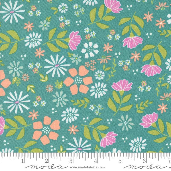 Image of the Laguna Sunrise Main Teal quilting cotton fabric by Sherri & Chelsi for Moda Fabrics. Features large colorful flowers on a teal background. 
Cute Little Fabric Shop