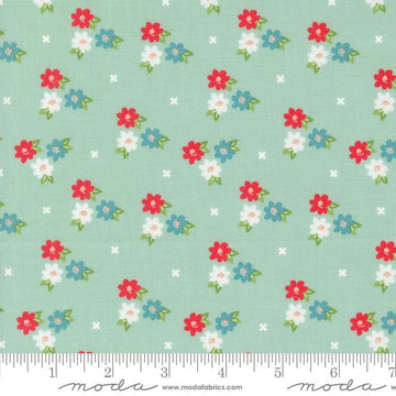 Image of the Laguna Sunrise Blossoms Home Town Sky quilting cotton fabric by Sherri & Chelsi for Moda Fabrics. Features small flowers on a light aqua background. 
Cute Little Fabric Shop