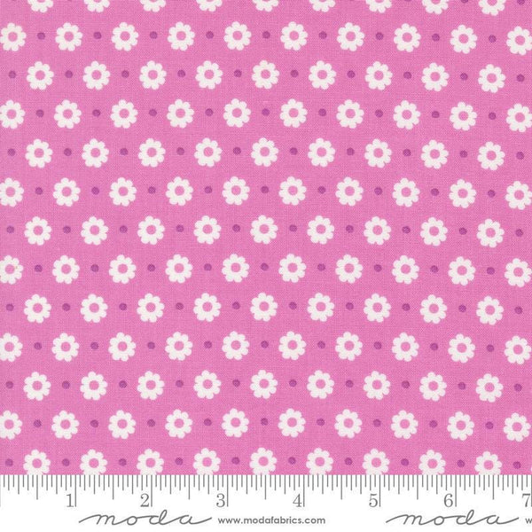 Image of the Laguna Sunrise Floral Dot Sweet Pea quilting cotton fabric by Sherri & Chelsi for Moda Fabrics. Features small flowers on a pink purple background. 
Cute Little Fabric Shop