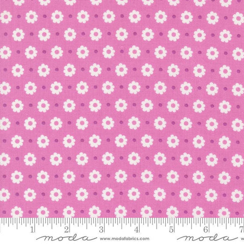 Image of the Laguna Sunrise Floral Dot Sweet Pea quilting cotton fabric by Sherri & Chelsi for Moda Fabrics. Features small flowers on a pink purple background. 
Cute Little Fabric Shop