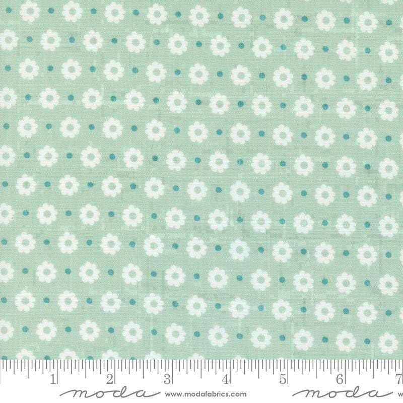 Image of the Laguna Sunrise Floral Dot Home Town Sky quilting cotton fabric by Sherri & Chelsi for Moda Fabrics. Features small flowers on a light mint background. 
Cute Little Fabric Shop