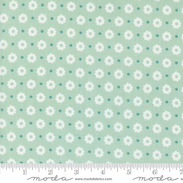 Image of the Laguna Sunrise Floral Dot Home Town Sky quilting cotton fabric by Sherri & Chelsi for Moda Fabrics. Features small flowers on a light mint background. 
Cute Little Fabric Shop