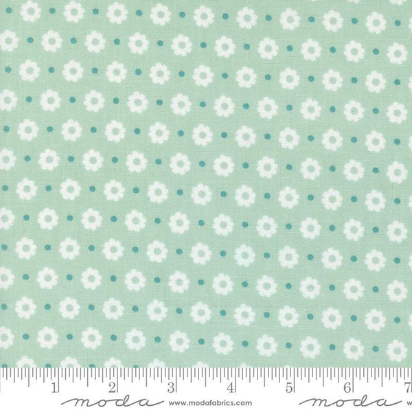 Image of the Laguna Sunrise Floral Dot Home Town Sky quilting cotton fabric by Sherri & Chelsi for Moda Fabrics. Features small flowers on a light mint background. 
Cute Little Fabric Shop