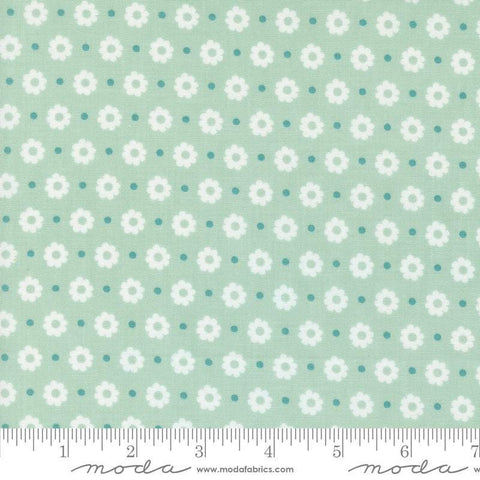 Image of the Laguna Sunrise Floral Dot Home Town Sky quilting cotton fabric by Sherri & Chelsi for Moda Fabrics. Features small flowers on a light mint background. 
Cute Little Fabric Shop