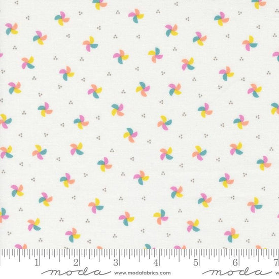 Image of the Laguna Sunrise Pinwheels Off White quilting cotton fabric by Sherri & Chelsi for Moda Fabrics. Features small scattered pinwheels on a white background. 
Cute Little Fabric Shop