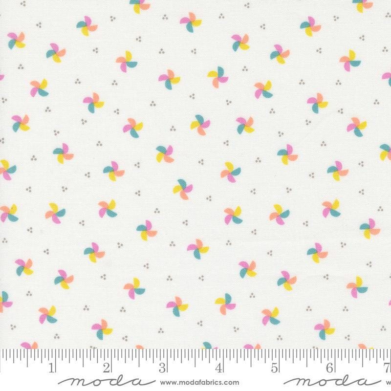 Image of the Laguna Sunrise Pinwheels Off White quilting cotton fabric by Sherri & Chelsi for Moda Fabrics. Features small scattered pinwheels on a white background. 
Cute Little Fabric Shop