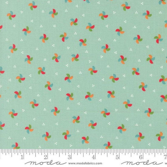 Image of the Laguna Sunrise Pinwheels Home Town Sky quilting cotton fabric by Sherri & Chelsi for Moda Fabrics. Features small scattered pinwheels on a mint aqua background. 
Cute Little Fabric Shop