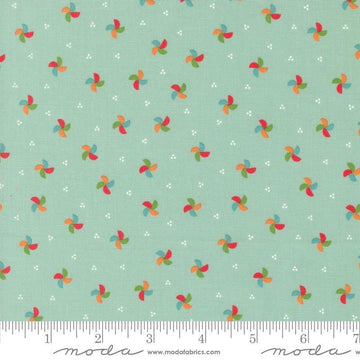 Image of the Laguna Sunrise Pinwheels Home Town Sky quilting cotton fabric by Sherri & Chelsi for Moda Fabrics. Features small scattered pinwheels on a mint aqua background. 
Cute Little Fabric Shop