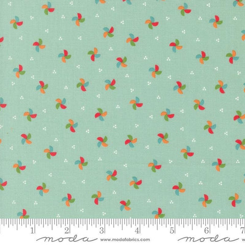 Image of the Laguna Sunrise Pinwheels Home Town Sky quilting cotton fabric by Sherri & Chelsi for Moda Fabrics. Features small scattered pinwheels on a mint aqua background. 
Cute Little Fabric Shop