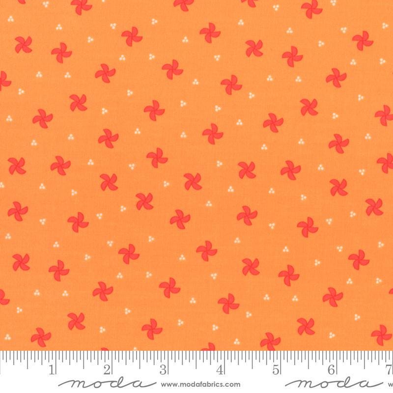 Image of the Laguna Sunrise Pinwheels Orange quilting cotton fabric by Sherri & Chelsi for Moda Fabrics. Features small scattered pinwheels on an orange background. 
Cute Little Fabric Shop