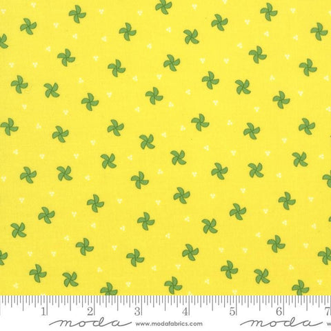 Image of the Laguna Sunrise Pinwheels Citrine quilting cotton fabric by Sherri & Chelsi for Moda Fabrics. Features small scattered pinwheels on a bright yellow background. 
Cute Little Fabric Shop