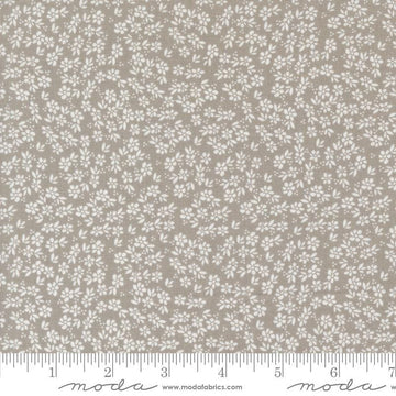 Image of the Laguna Sunrise Small Flowers Stone quilting cotton fabric by Sherri & Chelsi for Moda Fabrics. Features small scattered flowers on a gray background. 
Cute Little Fabric Shop