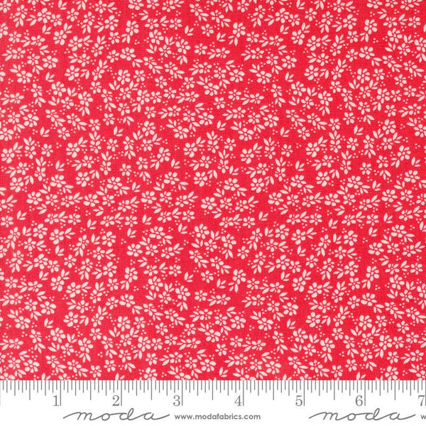 Image of the Laguna Sunrise Small Flowers Geranium quilting cotton fabric by Sherri & Chelsi for Moda Fabrics. Features small scattered flowers on a bright red background. 
Cute Little Fabric Shop