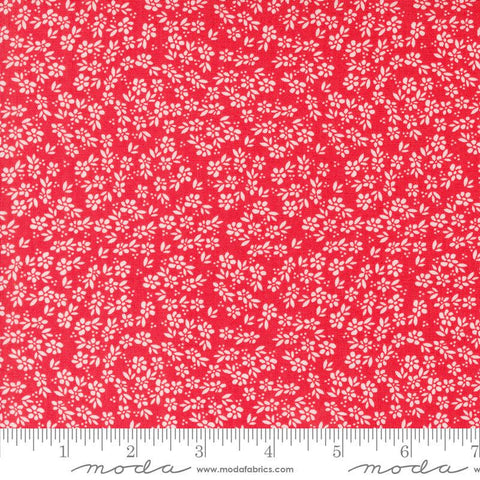 Image of the Laguna Sunrise Small Flowers Geranium quilting cotton fabric by Sherri & Chelsi for Moda Fabrics. Features small scattered flowers on a bright red background. 
Cute Little Fabric Shop