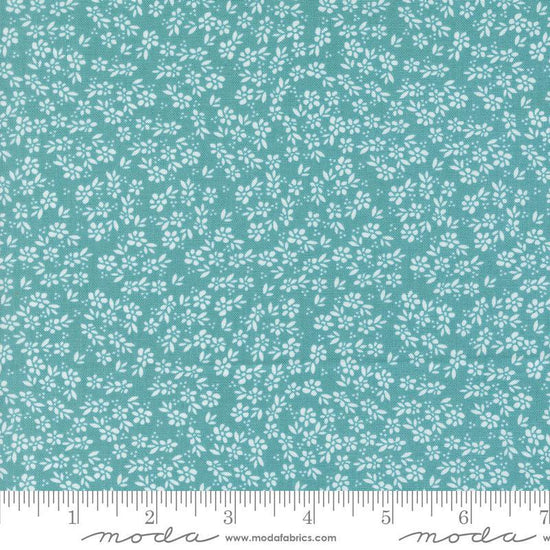Image of the Laguna Sunrise Small Flowers Teal quilting cotton fabric by Sherri & Chelsi for Moda Fabrics. Features small scattered flowers on a bright teal background. 
Cute Little Fabric Shop