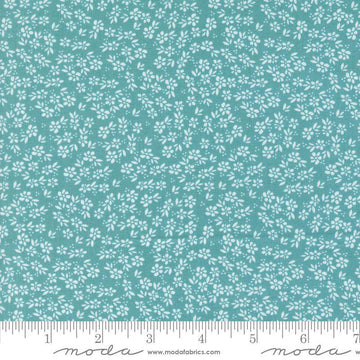 Image of the Laguna Sunrise Small Flowers Teal quilting cotton fabric by Sherri & Chelsi for Moda Fabrics. Features small scattered flowers on a bright teal background. 
Cute Little Fabric Shop