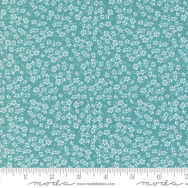 Image of the Laguna Sunrise Small Flowers Teal quilting cotton fabric by Sherri & Chelsi for Moda Fabrics. Features small scattered flowers on a bright teal background. 
Cute Little Fabric Shop