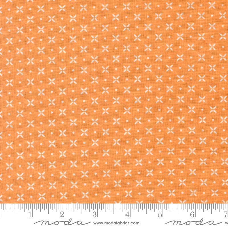 Image of the Laguna Sunrise Orange Peel Orange quilting cotton fabric by Sherri & Chelsi for Moda Fabrics. Features small geometric orange peels on an orange background. 
Cute Little Fabric Shop