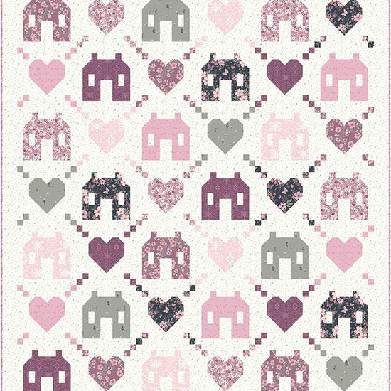 Image of the Friendly Neighborhood quilt pattern by Wendy Sheppard for Riley Blake Designs. Features houses and hearts on a white quilt pattern. 
Cute Little Fabric Shop