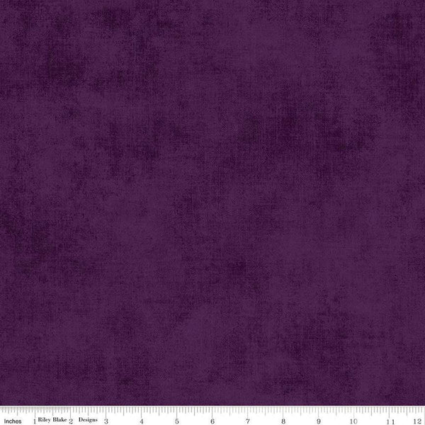 Image of the Shades Plum quilting cotton fabric by Riley Blake Designs. Features a dark purple fabric with a mottled semisold background. 
Cute Little Fabric Shop